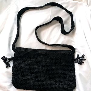 The Sak crocheted black mini crossbody purse